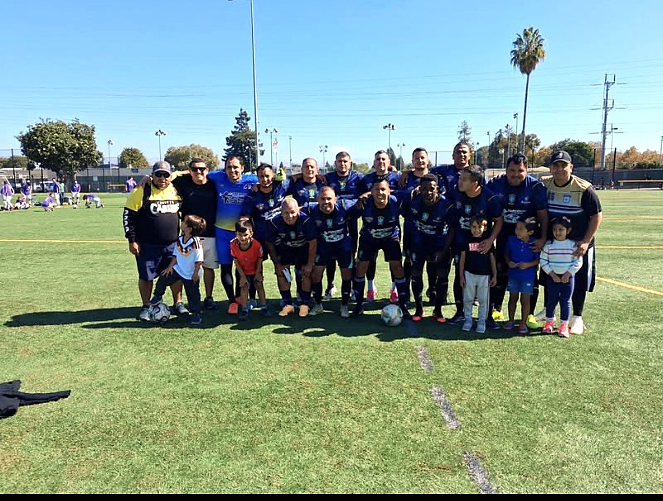 Equipo de la liga con sus familias